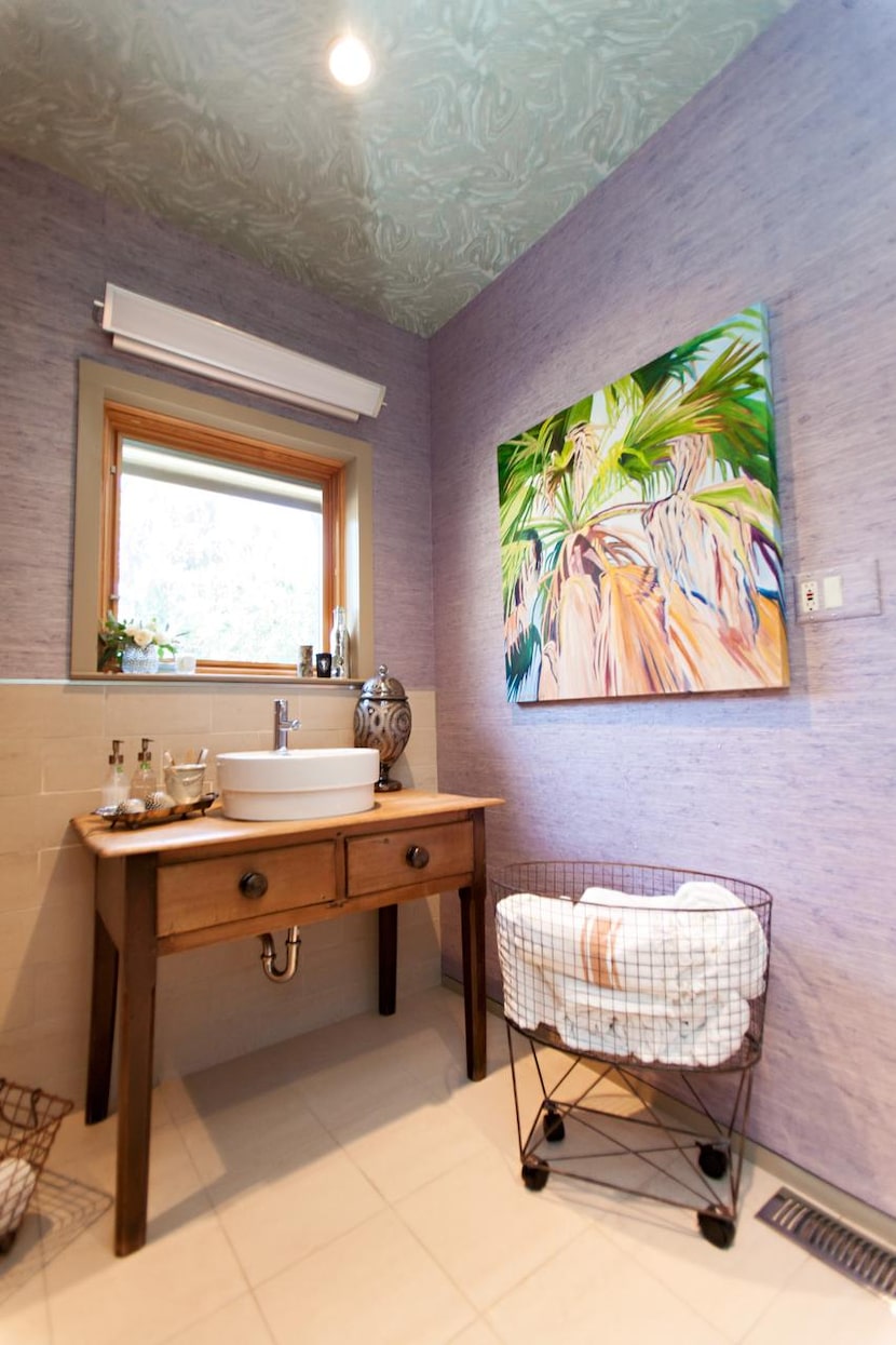 Outfit a guest bathroom with fresh flowers, beautiful hand towels and a few necessities to...