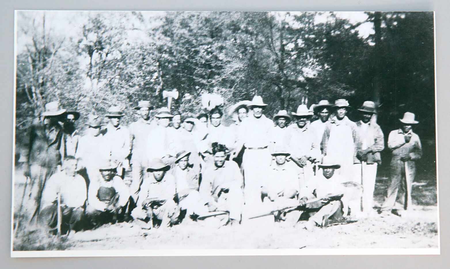 At right is Maria Lozada Garcia's grandfather, among the men who built the Trinity River...