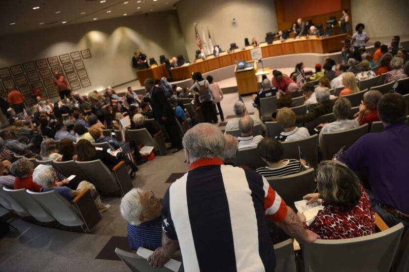 A crowd gathers for an Irving city council meeting to speak out on Texas House Bill 562 at...