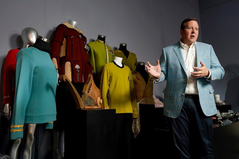 Joshua Benesh, Heritage Auction's chief strategy officer, talks to reporters about Greg...