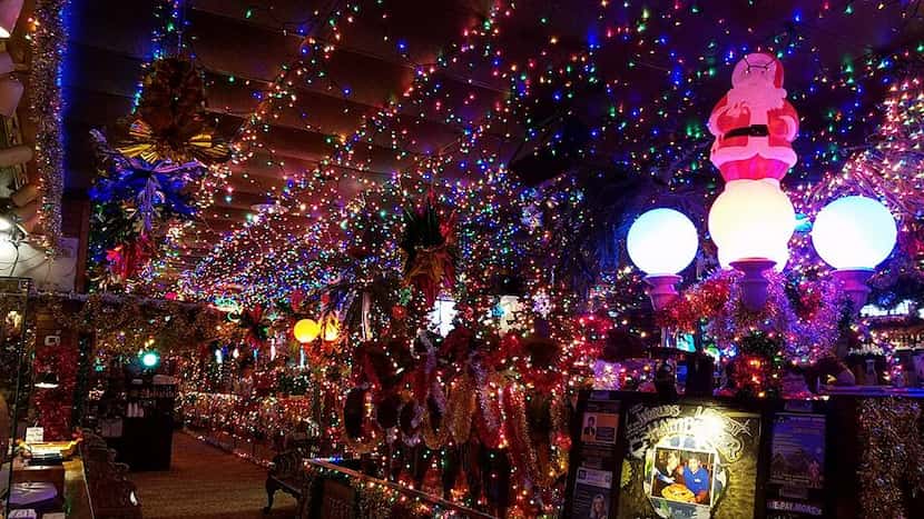 Christmas lights run along the ceiling at Campo Verde in Arlington. The Mexican restaurant...