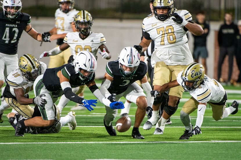 Prosper’s TJ Jones (2),  Bo Mongaras (3) and Plano East's Joshua Palma (2) went after a...