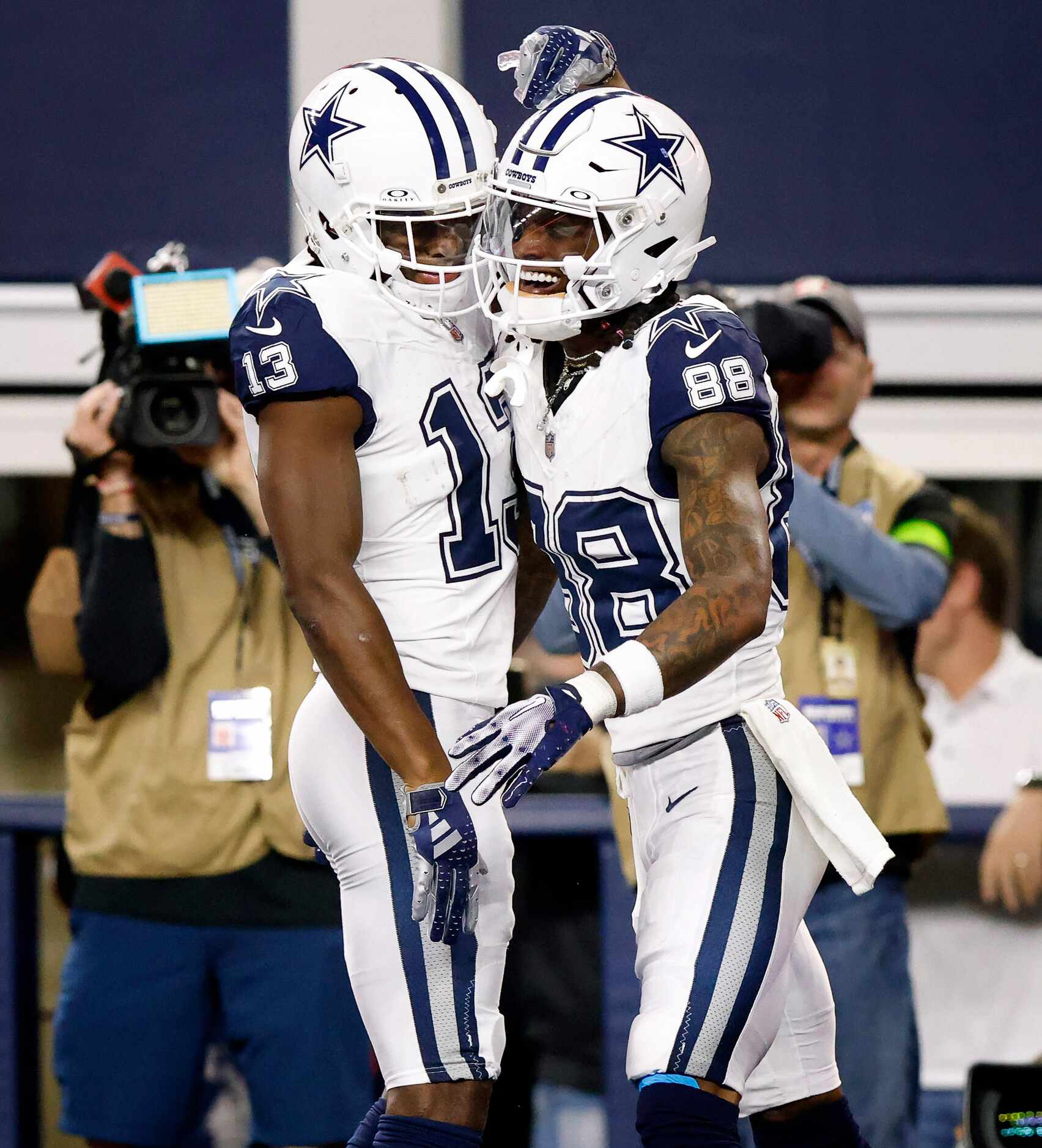 Dallas Cowboys wide receiver Michael Gallup (13) congratulates fellow receiver CeeDee Lamb...