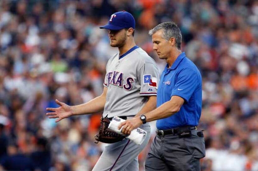 Rangers starter Justin Grimm leaves Friday's game in the fifth inning (Getty Images)