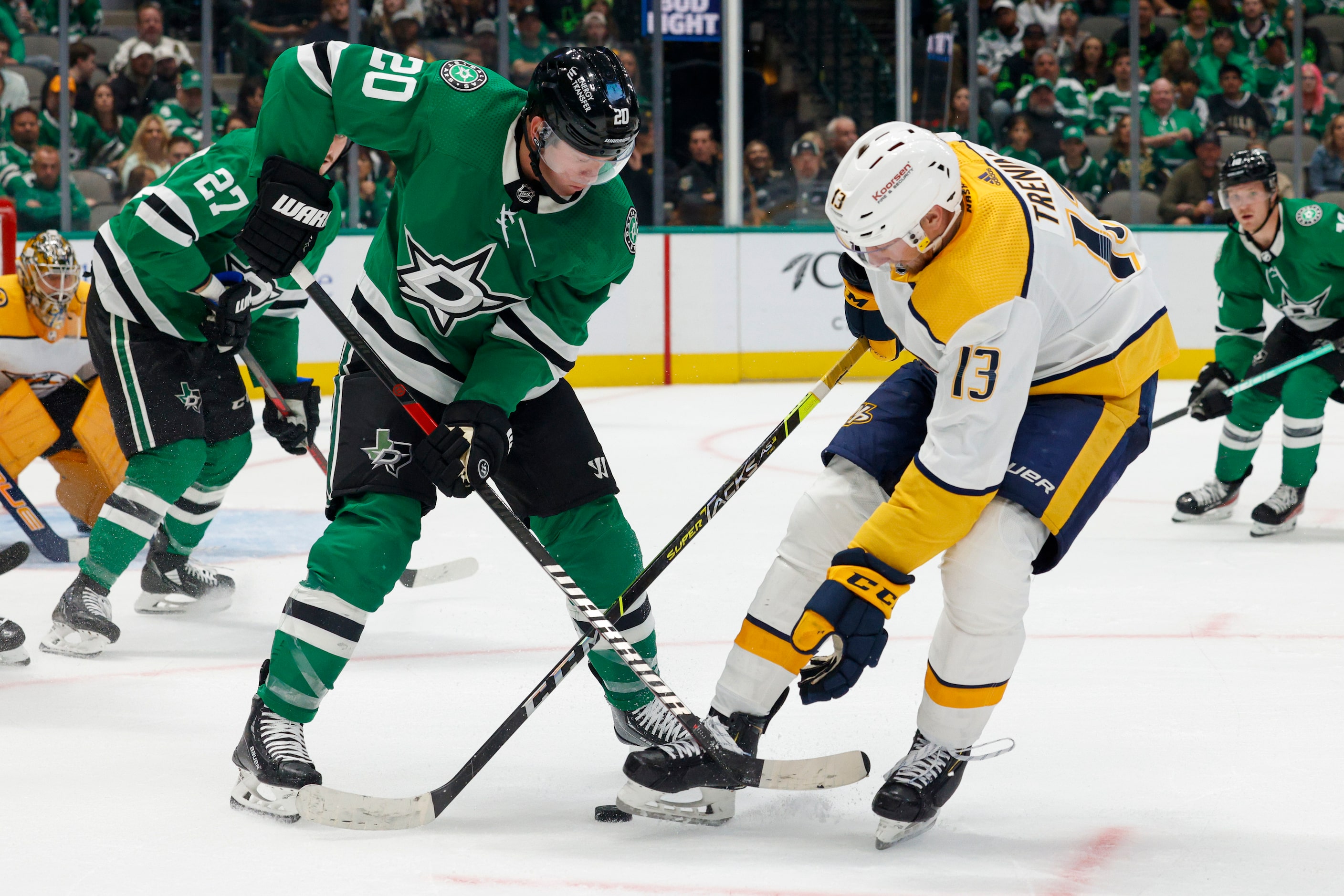 Dallas Stars defenseman Ryan Suter (20) and Nashville Predators center Yakov Trenin (13)...