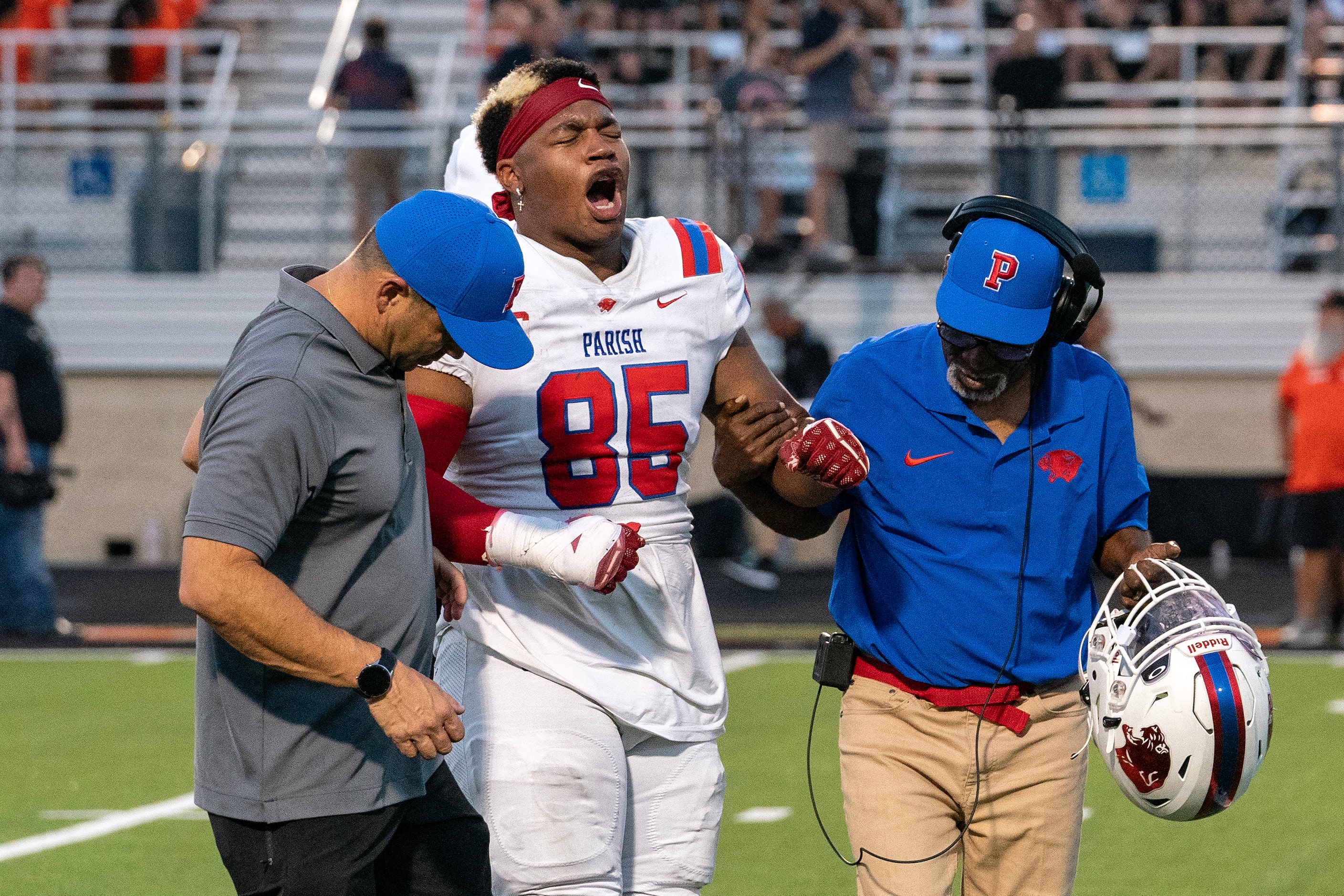 Parish Episcopal senior defensive lineman Caleb Mitchell Irving (85) yells in frustration as...