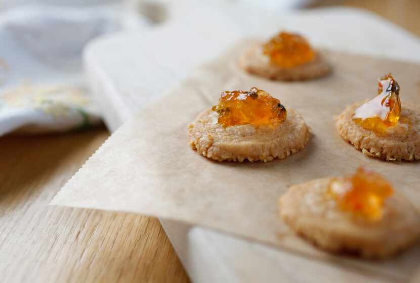 Cheese coins with pepper jelly photographed at Start Restaurant in Dallas on Friday, Sept....