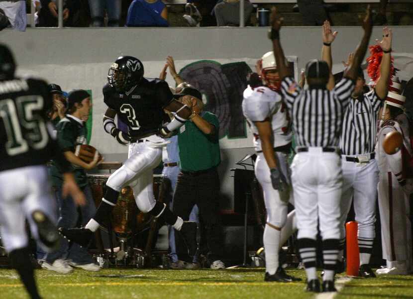 Friday, September 19, 2003: Referees signal a touchdown as Richardson Berkner receiver Aqib...