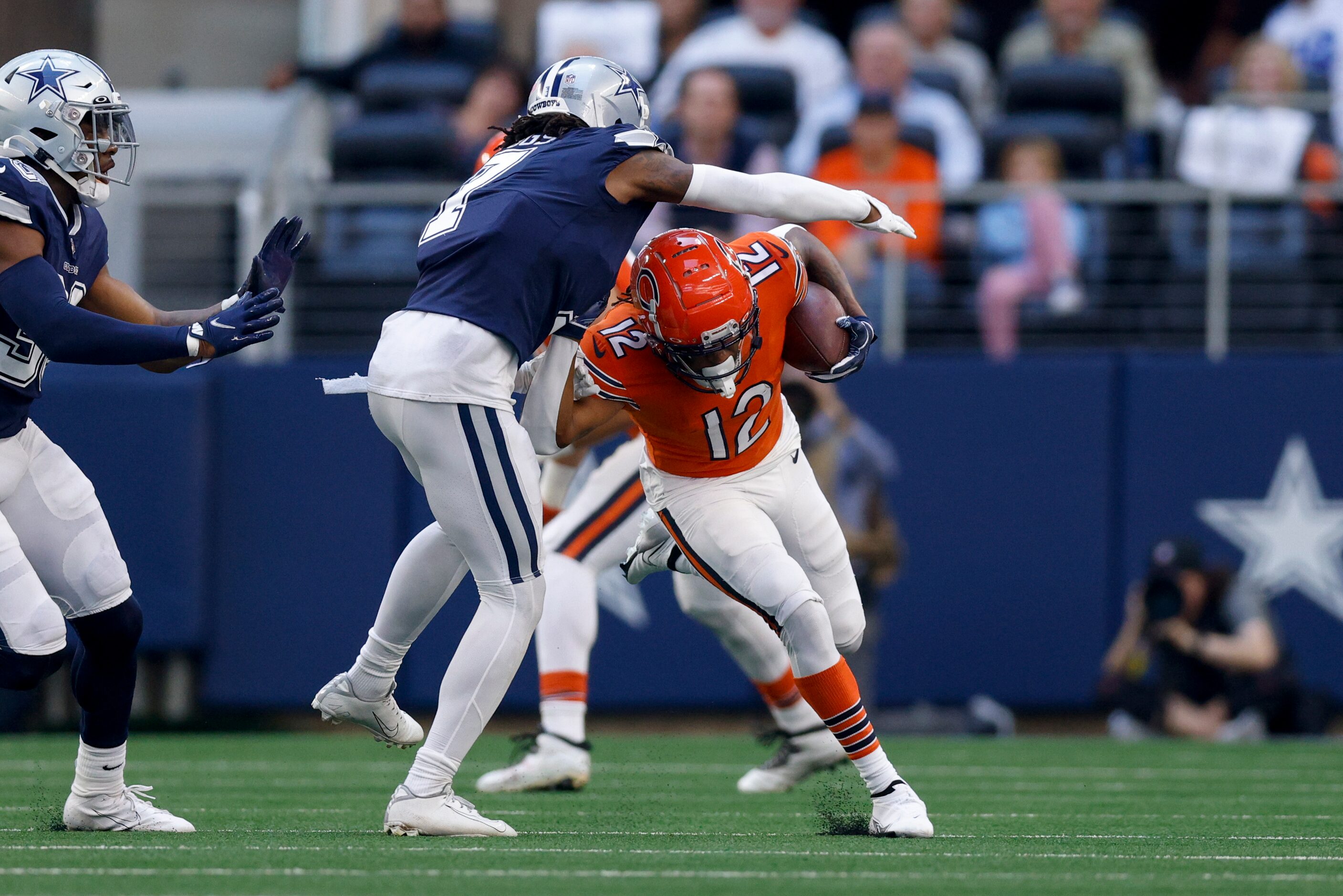 Dallas Cowboys cornerback Trevon Diggs (7) tackles Chicago Bears wide receiver Velus Jones...