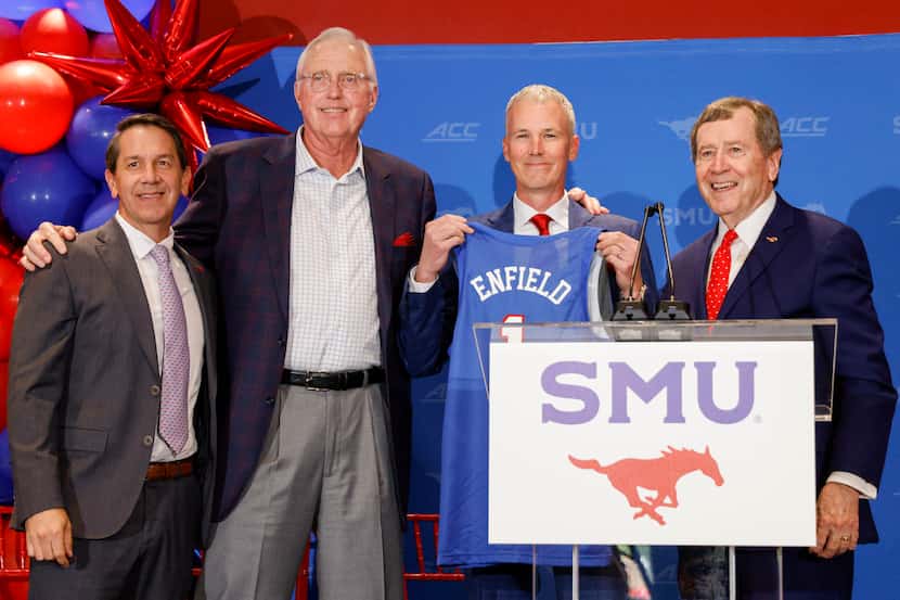 SMU director of athletics Rick Hart (from left), David B. Miller, chair of the board of...