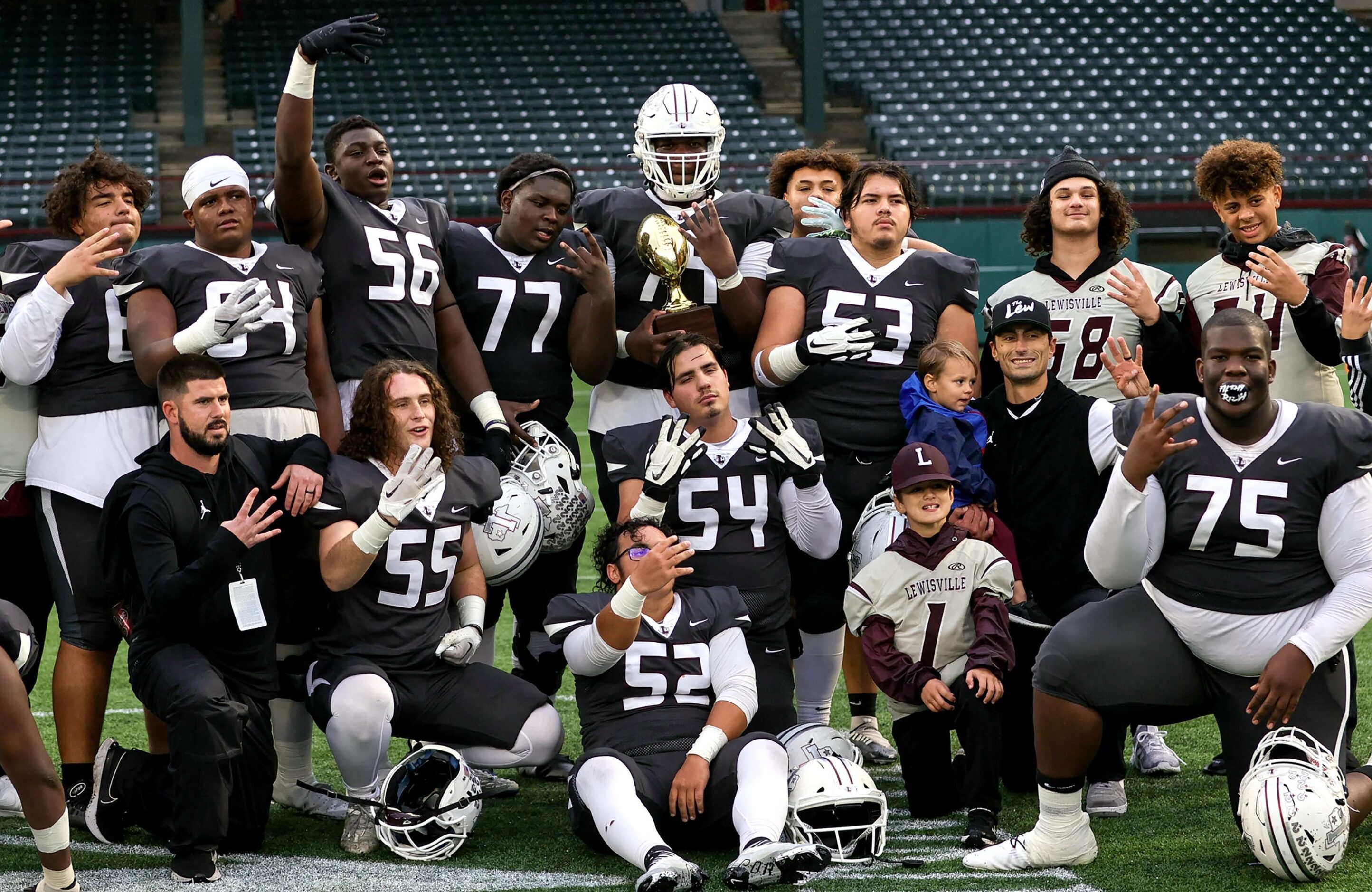 The Lewisville Fighting Farmers celebrate their victory over Keller, 43-3 in a Class 6A...