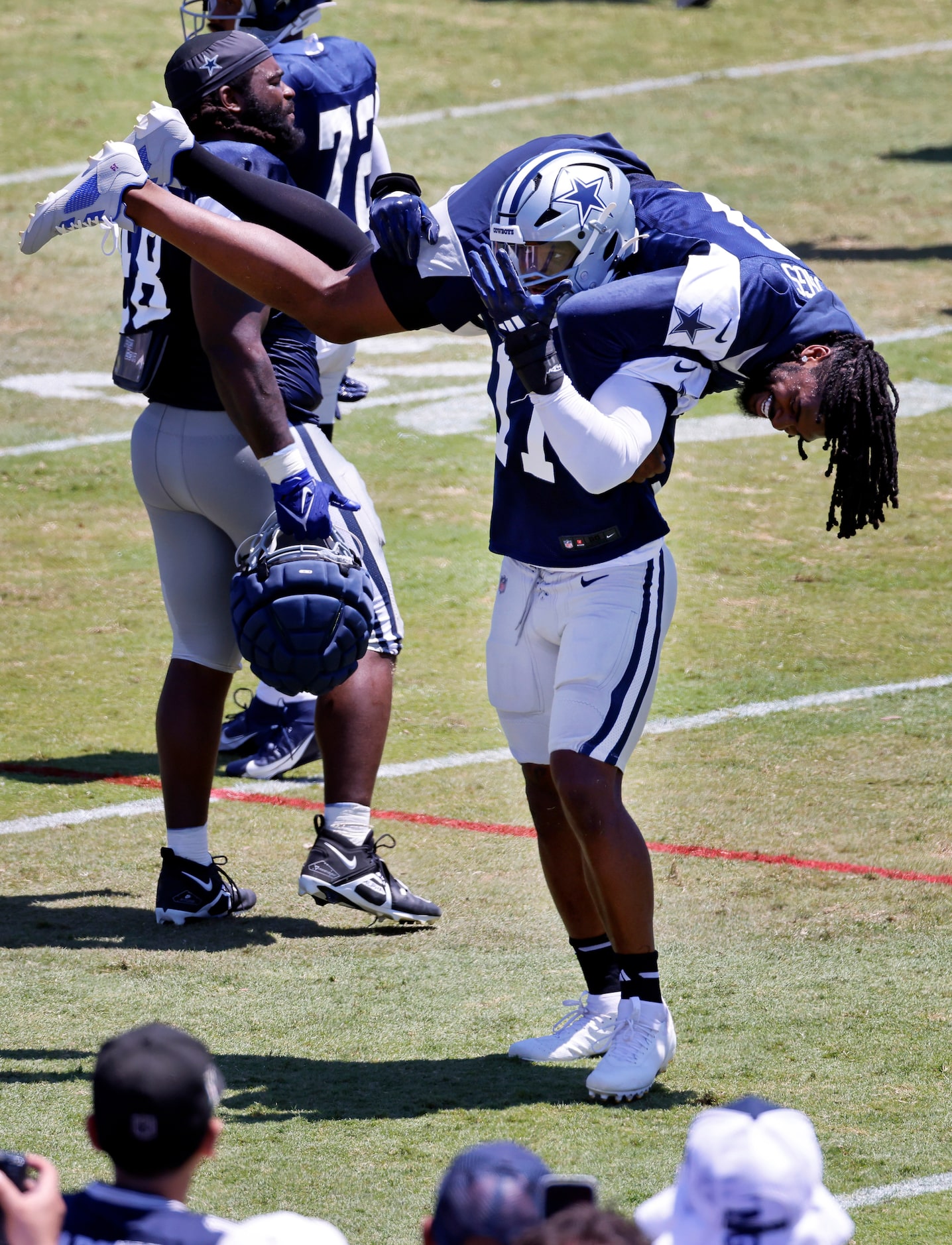 Dallas Cowboys linebacker Micah Parsons (11) encourages the fans to cheer after picking up...