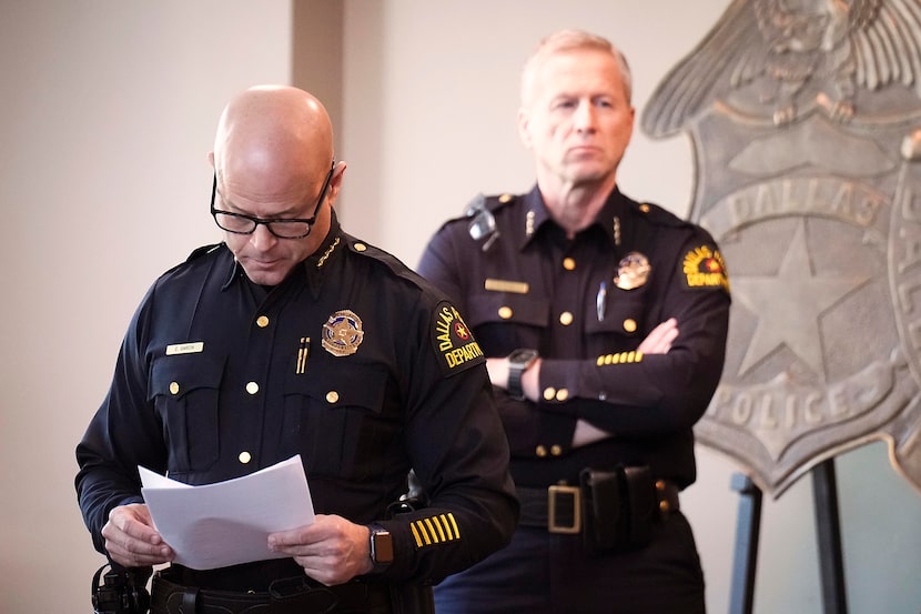 Dallas police Chief Eddie García stands to the side as a video is shown during a press...