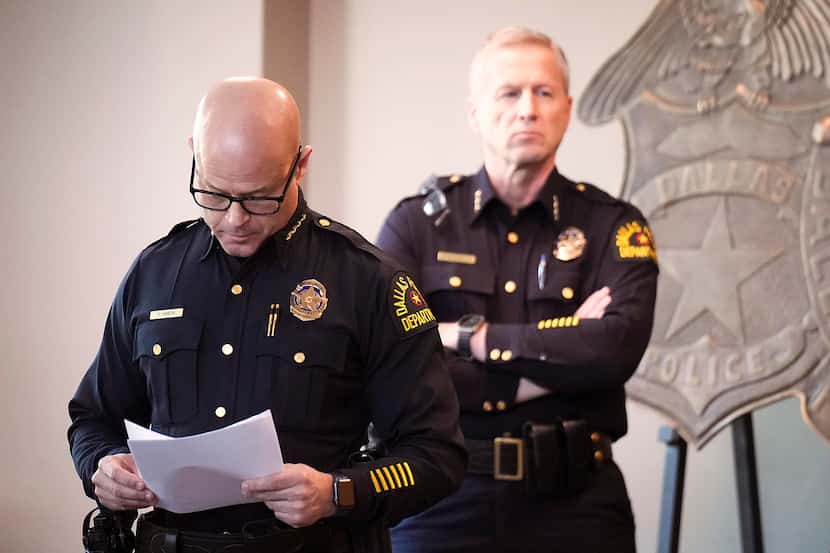 Dallas police Chief Eddie Garcia stands to the side as a video is shown during a press...