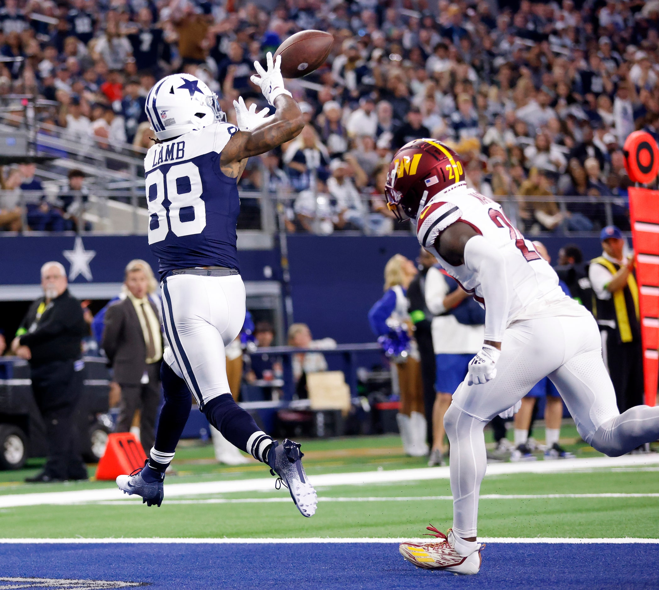 Dallas Cowboys wide receiver CeeDee Lamb (88) catches a fourth quarter touchdown in front of...