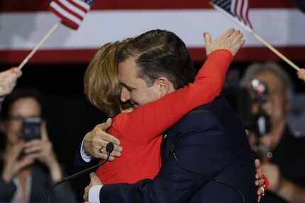 Republican presidential candidate Sen. Ted Cruz, R-Texas, hugs former Hewlett-Packard CEO...