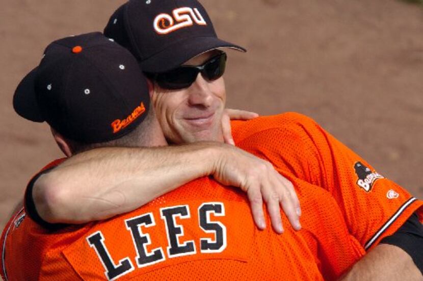ORG XMIT: *S0413144953* Oregon State's head coach Pat Casey hugs assistant Marty Lees after...