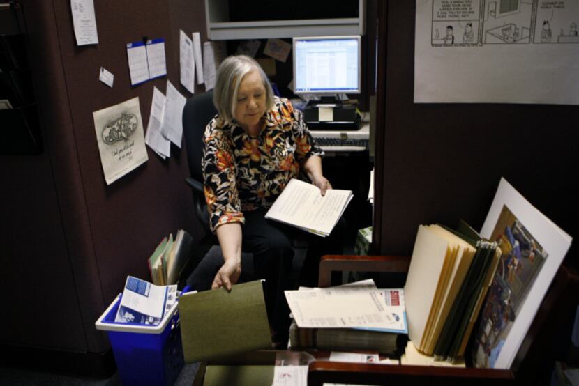 Alan Heath, publisher and CEO works in his sparse office during the final days of the United...