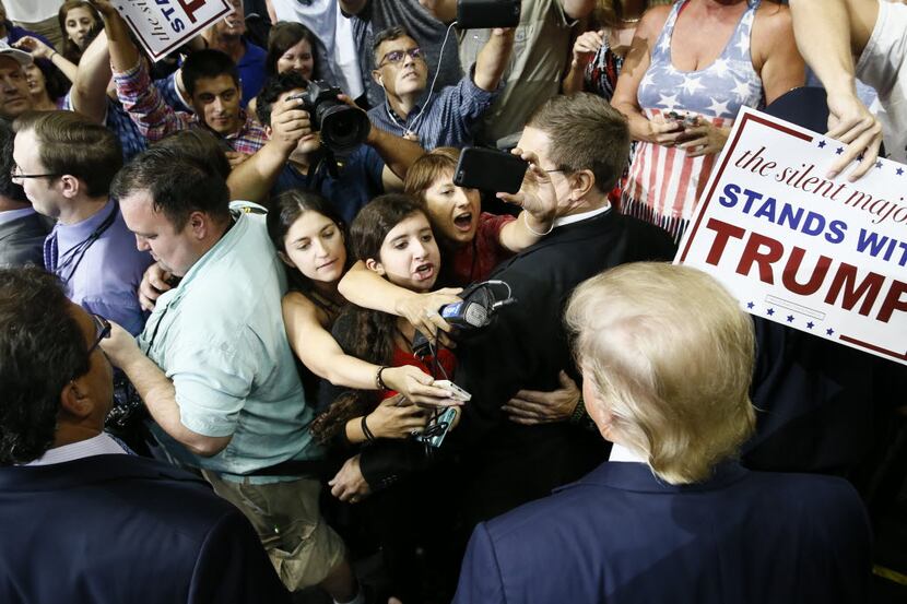 Trump worked the crowd after his September 2015 speech at American Airlines Center in...