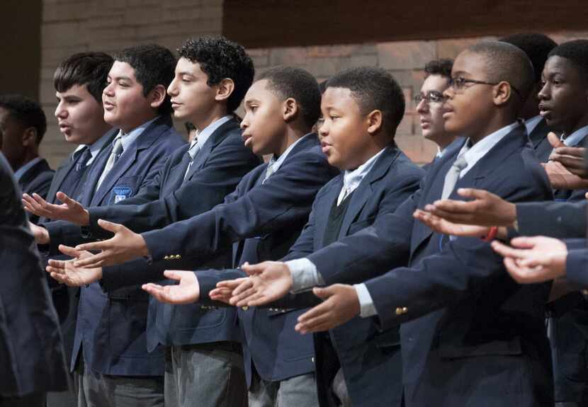 Members of the glee club at Barack Obama Male Leadership Academy performed during the Martin...