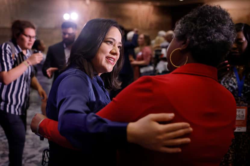 Texas Attorney General challenger Rochelle Garza (left) is greeted by Texas State...