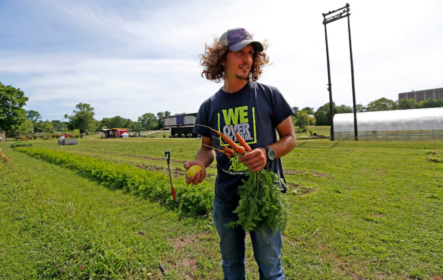 James Hunter, a farm director, gives a tour of We Over Me farm at Paul Quinn College.