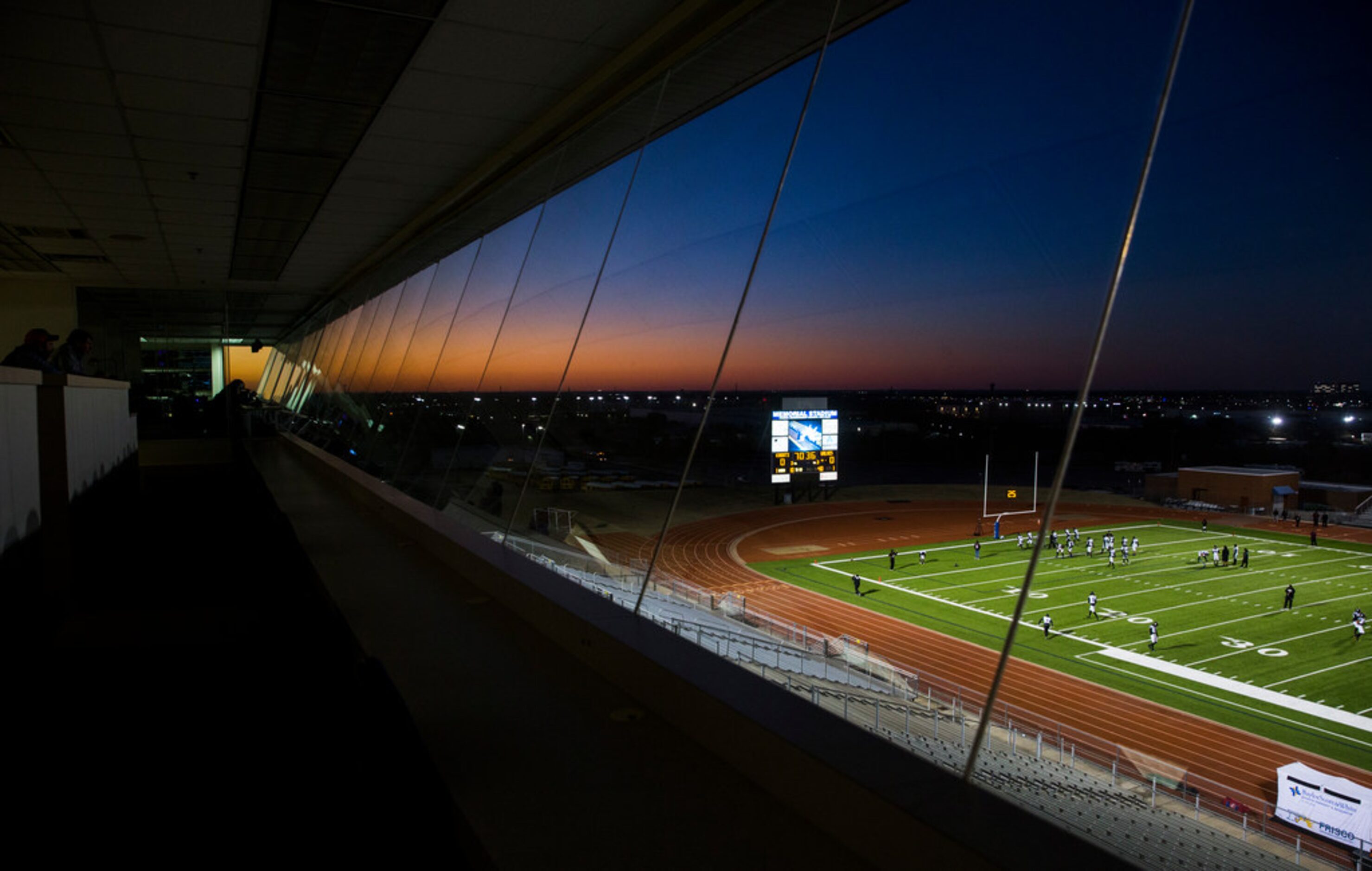 Mansfield Timberview football players can be seen from the press box as they warm up before...