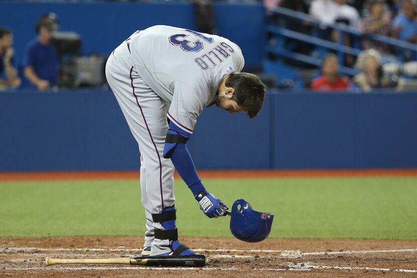 Joey Gallo #13 of the Texas Rangers reacts after striking out in the fourth inning during...