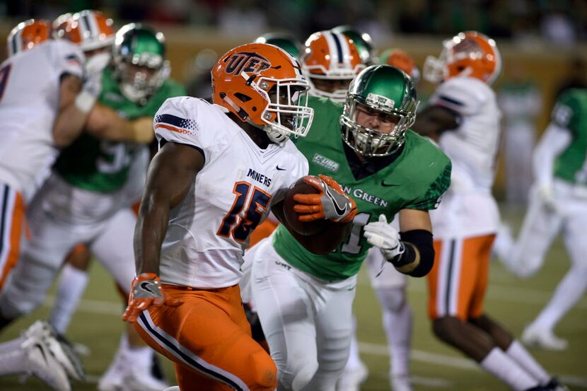 North Texas linebacker Colton McDonald (41) prepares to tackle UTEP running back Kevin Dove...