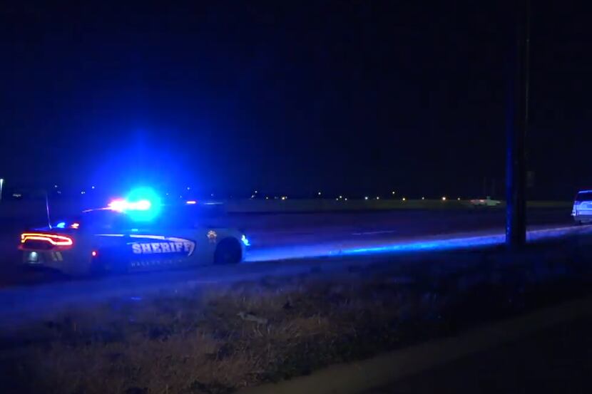 A Dallas County sheriff's vehicle at the scene of a fatal crash in which a driver struck a...