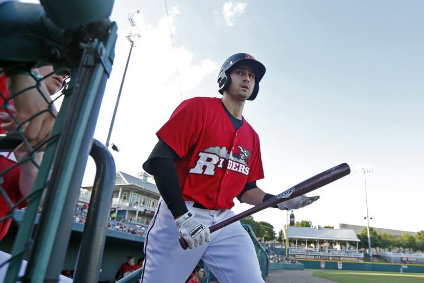 In this file photo from 2014, Joey Gallo prepares for his first at-bat as he debuts for the...