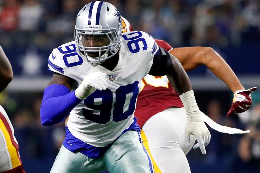 FILE - In this Nov. 22, 2018, file photo, Dallas Cowboys defensive end Demarcus Lawrence...