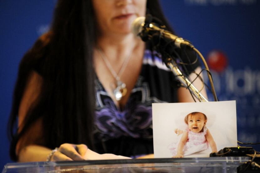 Kristie Reeves-Cavaliero displayed a photo of her daughter Ray Ray, who died at age 1 when...