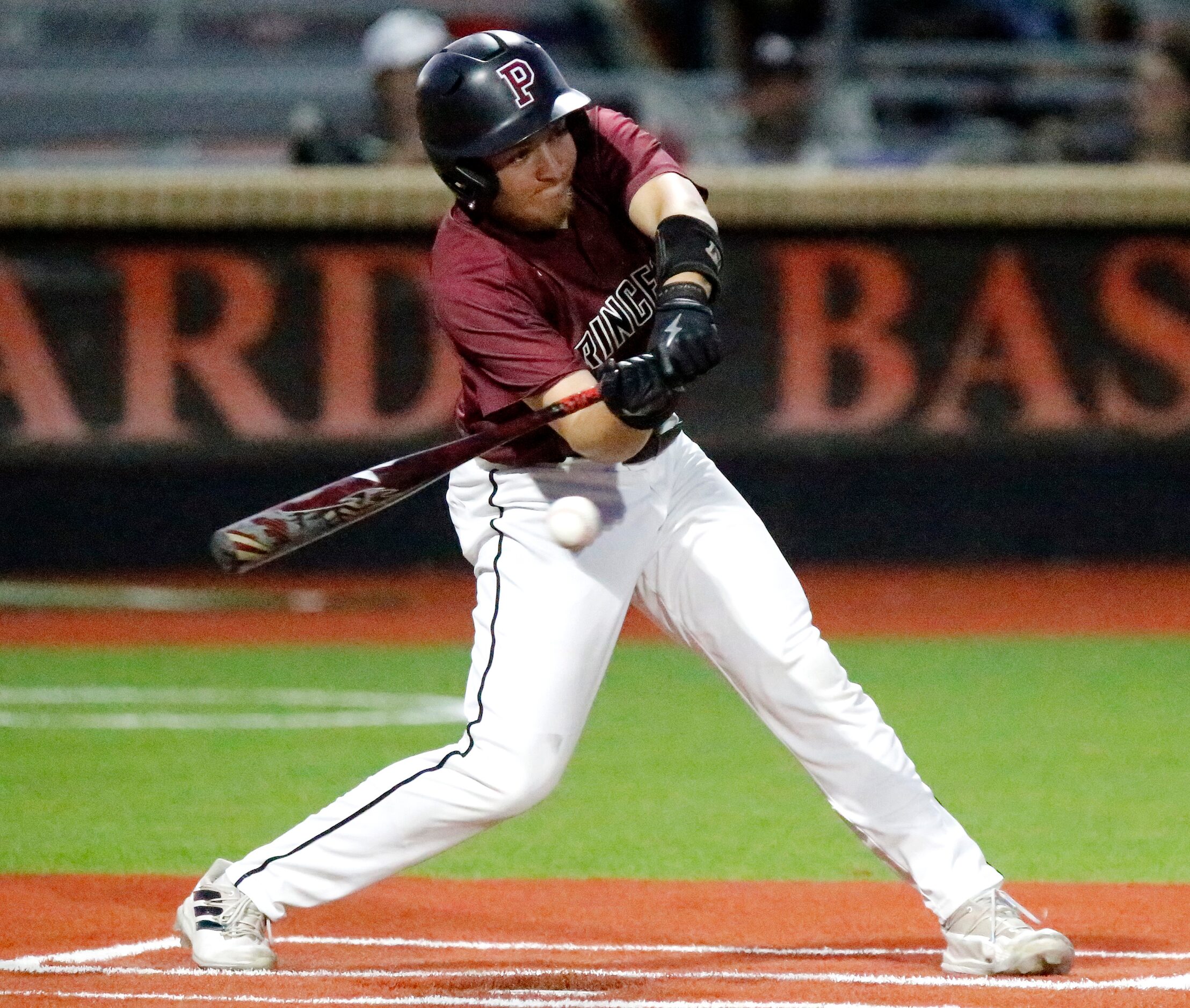 Princeton High School shortstop Chad Kyle (10) makes contact in the third inning as Lovejoy...