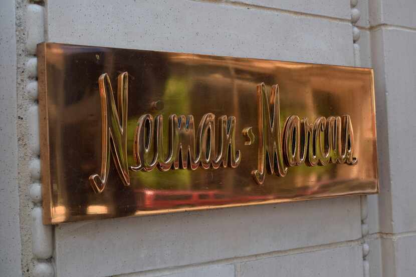 This May 12, 2016 photo shows a Neiman Marcus nameplate outside the department store in...