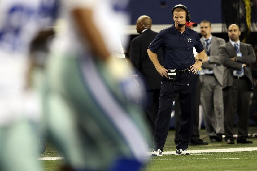 Dallas Cowboys head coach Jason Garrett watches after Green Bay Packers scored a touchdown...