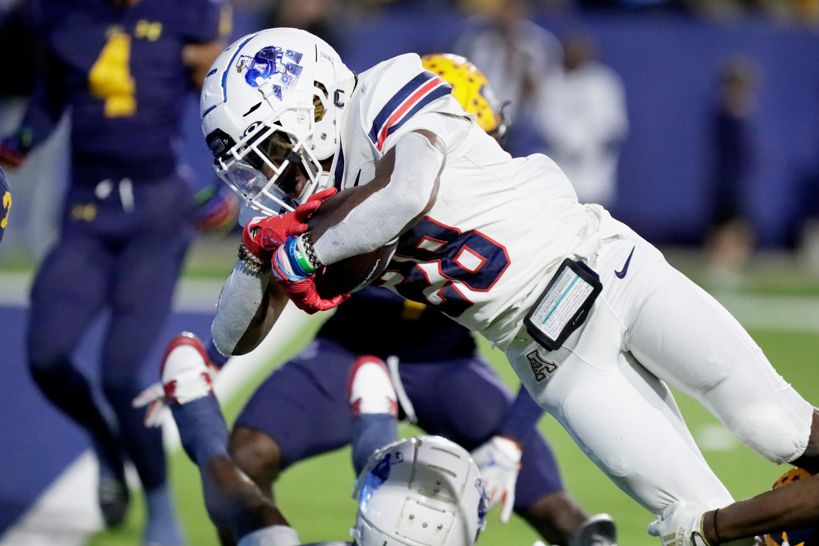 Allen High School running back Amir Mcdowell (28) goes in for a touchdown during the first...