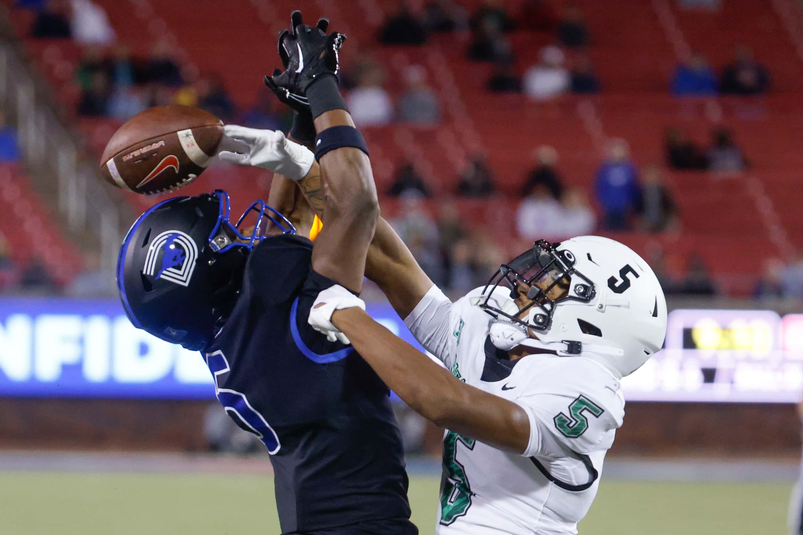 North Texas Mean Green cornerback Ridge Texada (5) breaks up a touchdown pass intended for...