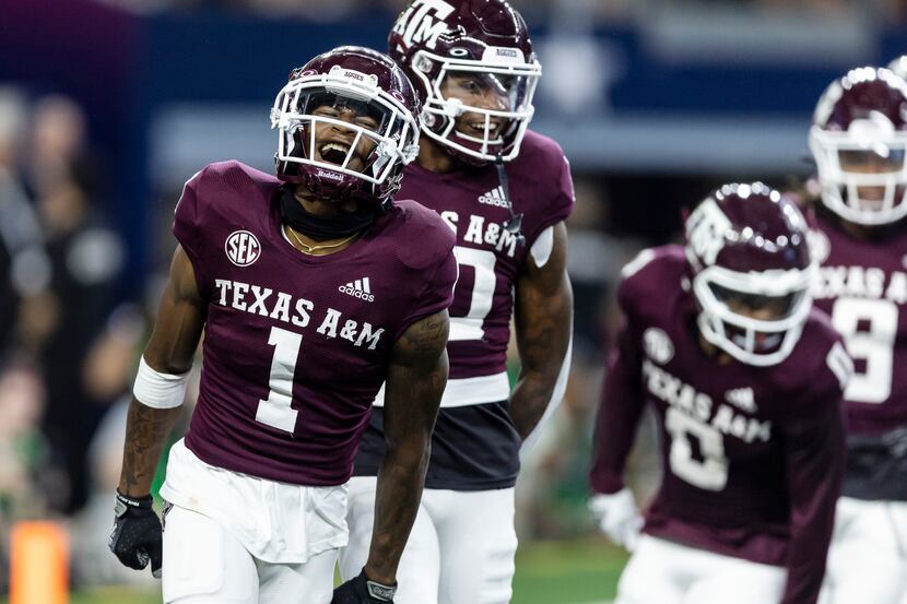 Texas A&M wide receiver Evan Stewart (1) celebrates his touchdown during the first half of...