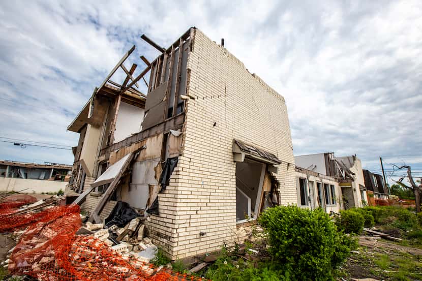 Destruction and debris from the October 2019 tornado remains on Glenrio Lane in Dallas on...