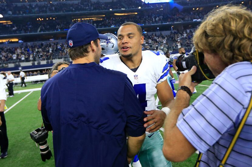 Tony Romo congratulated fellow Cowboys quarterback Dak Prescott after a win over Chicago in...
