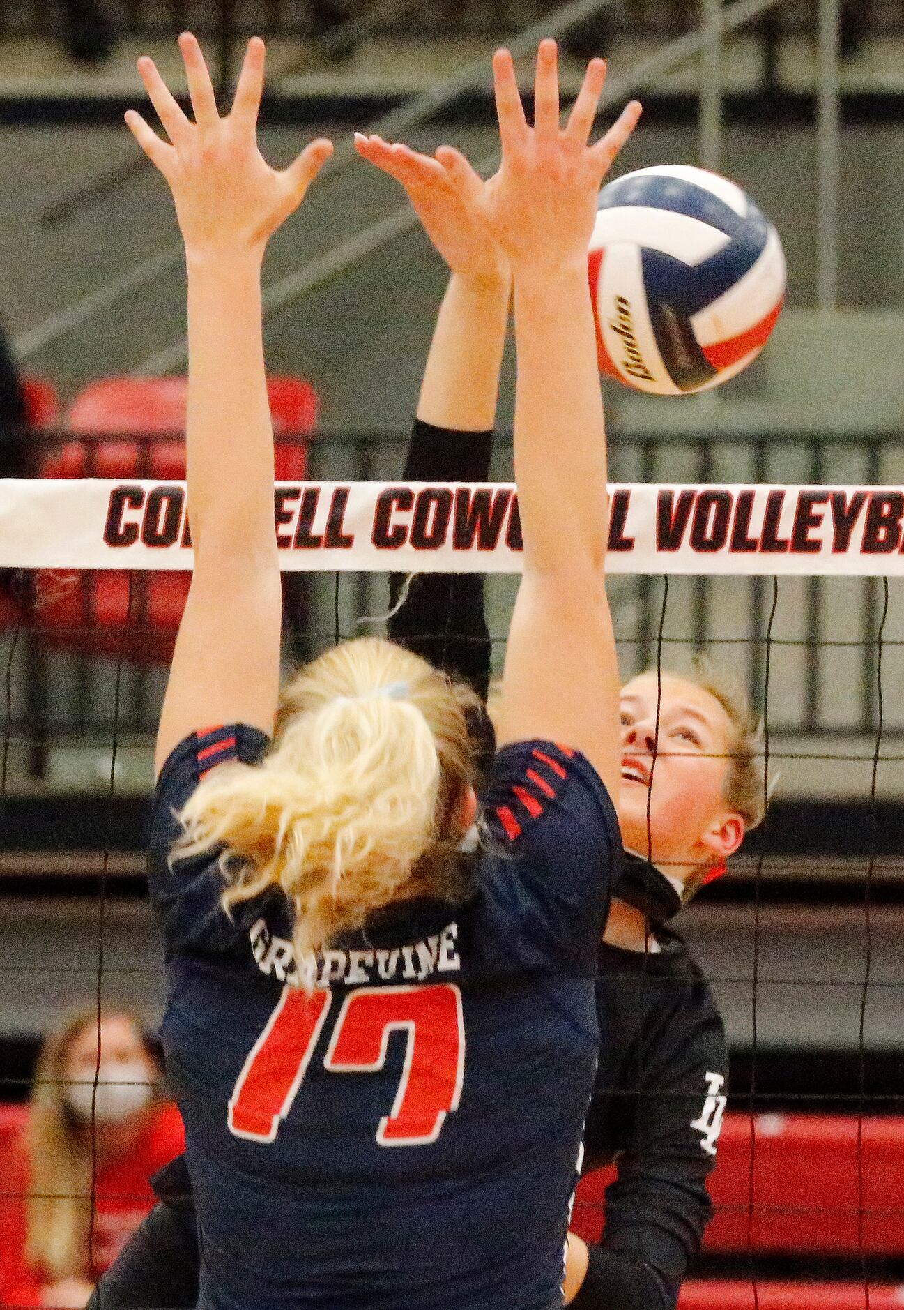 Lovejoy High School setter Rosemary Archer (17) gets a hit past Grapevine High School middle...