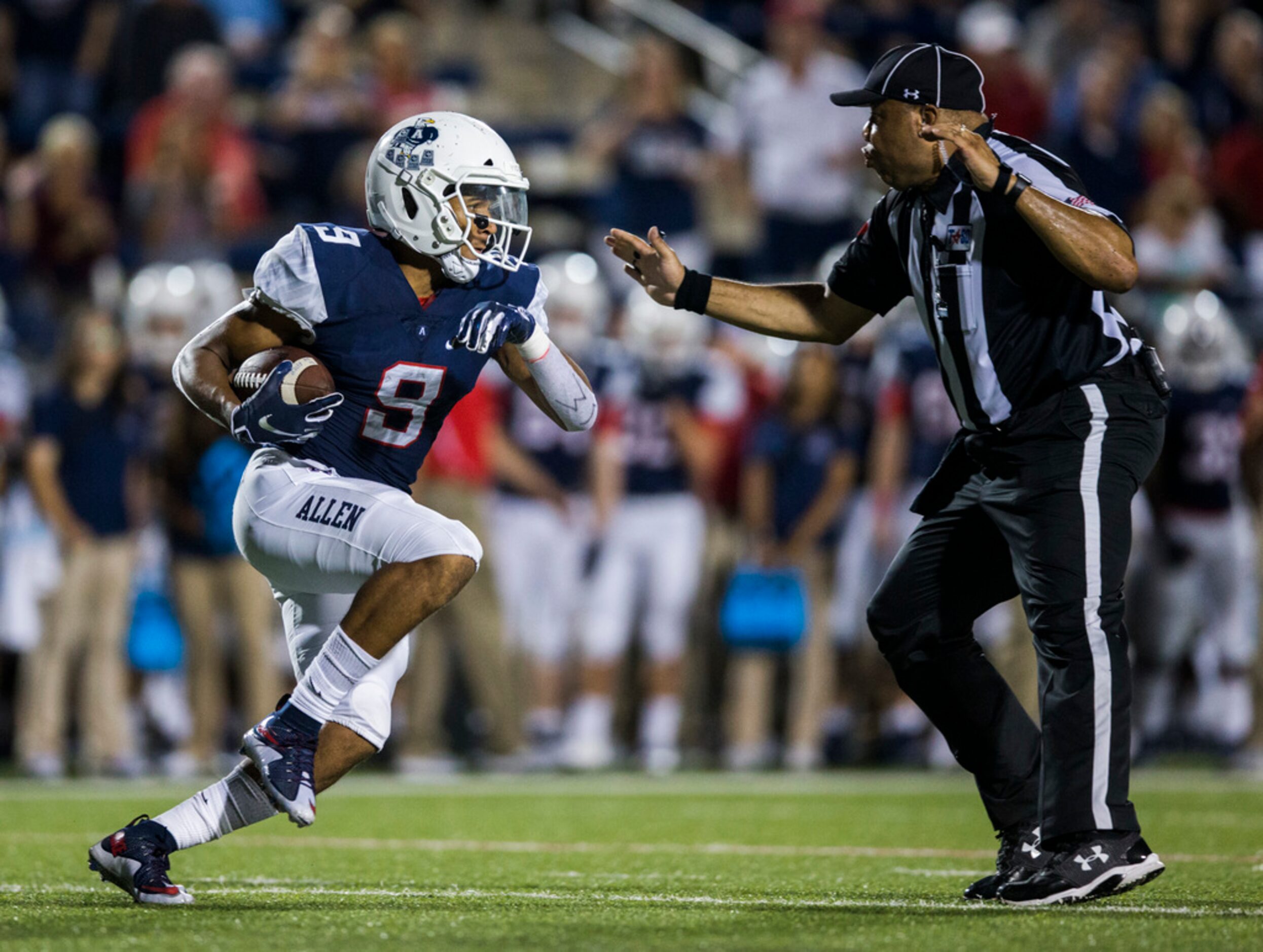 Allen wide receiver Bryson Green (9) nearly runs in to a referee during the second quarter...