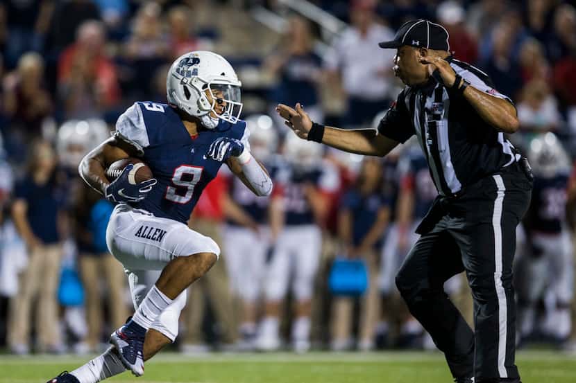 Allen wide receiver Bryson Green (9) nearly runs in to a referee during the second quarter...