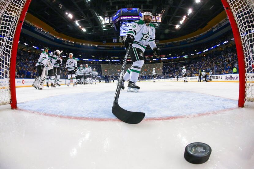 ST. LOUIS, MO - MAY 5: Vernon Fiddler #38 of the Dallas Stars collects the puck after the...