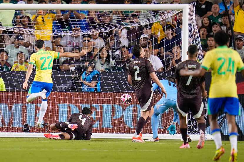 Brazil's Gabriel Teodoro Silva (22) puts the ball in the Mexico net for a a goal during the...