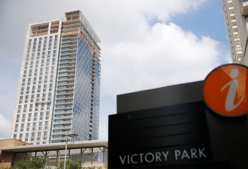 Construction continues at The Victor an apartment tower next to American Airlines Center in...