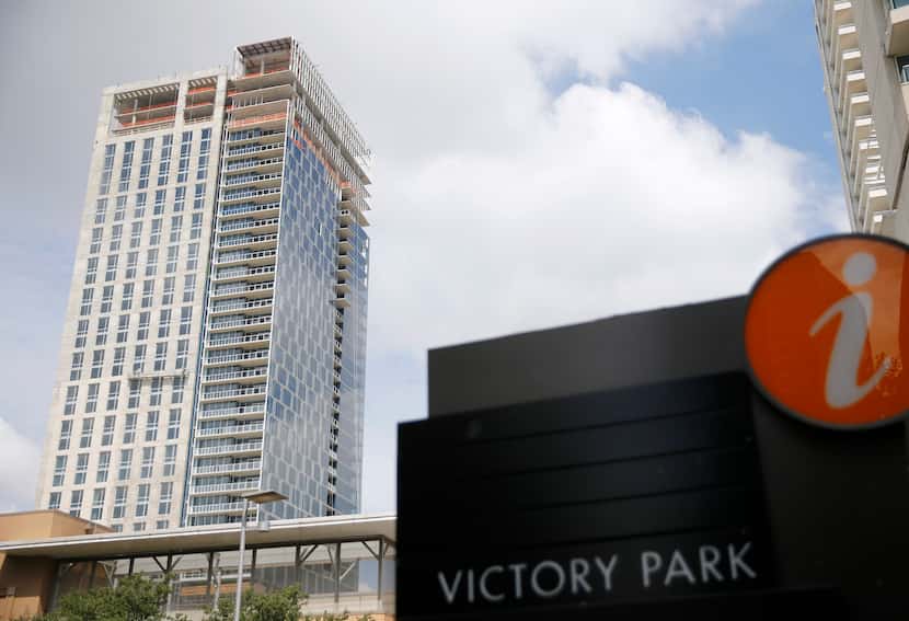 Construction continues at The Victor an apartment tower next to American Airlines Center in...