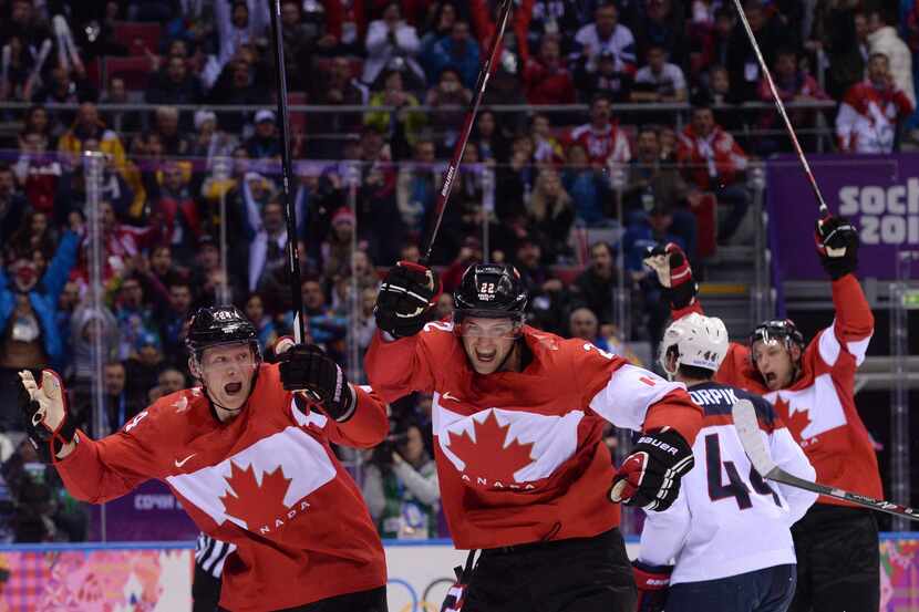 Canada's Jamie Benn (C) celebrates scoring his team's first goal during the Men's Ice Hockey...