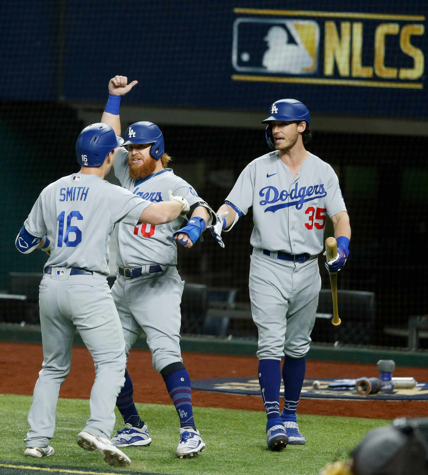 Los Angeles Dodgers catcher Will Smith (16) celebrates with Los Angeles Dodgers third...